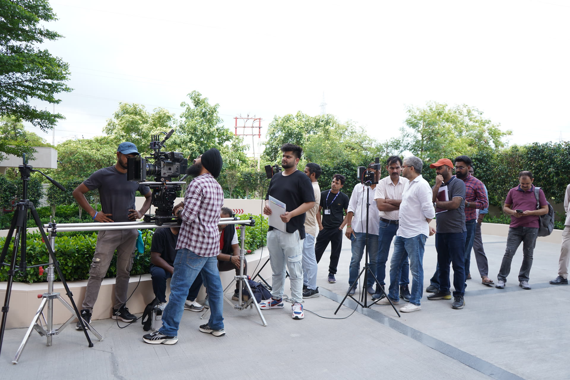 Digital Angle film crew on outdoor set with camera on slider